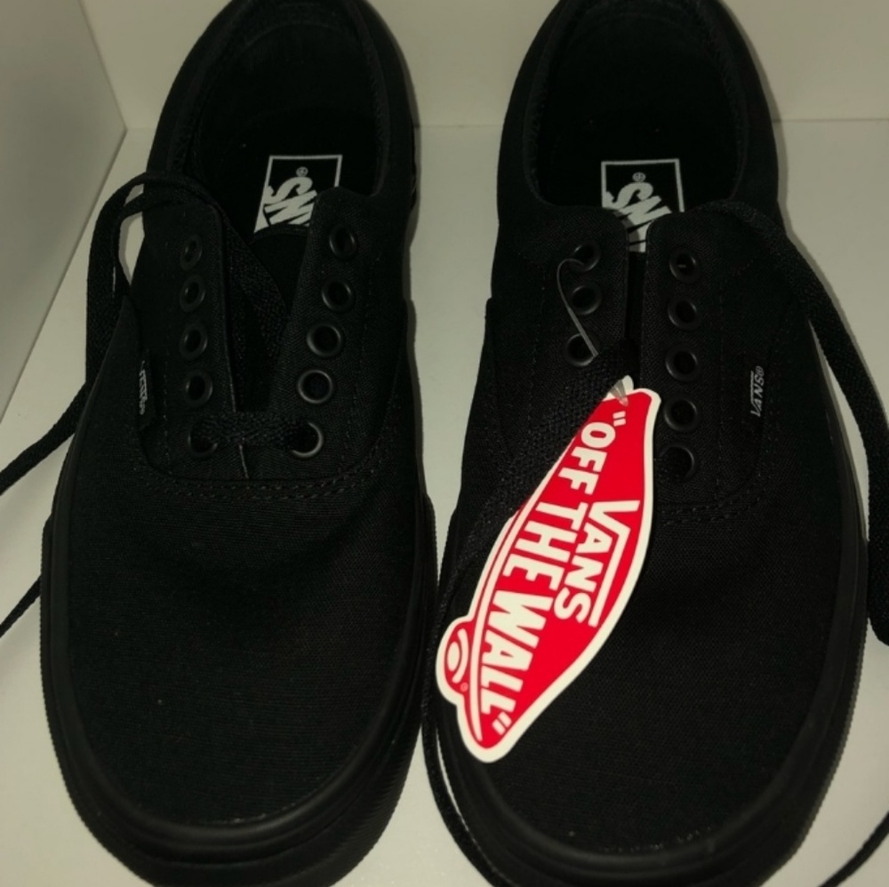 New pair of black vans